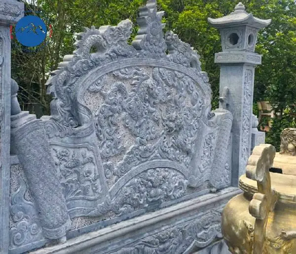 Mẫu cuốn thư đá xanh rêu chạm khắc chữ Thọ hóa rồng quý