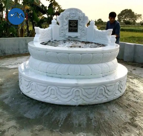 Mẫu mộ tròn đá trắng nguyên khối thiết kế giật cấp truyền thống