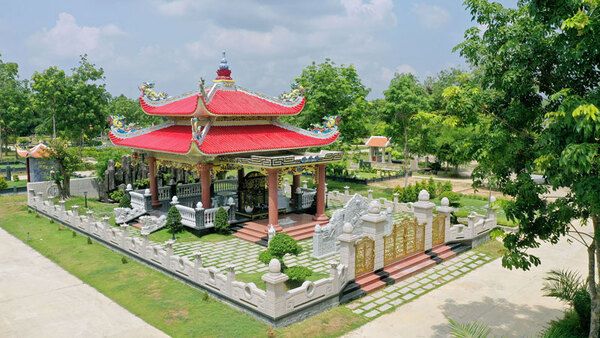 Mẫu mộ mái thái hai tầng đá xanh khắc hoa văn